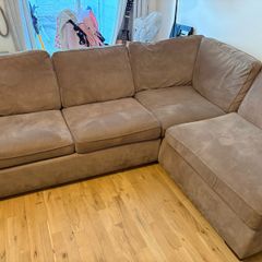 Brown L shape sofa bed