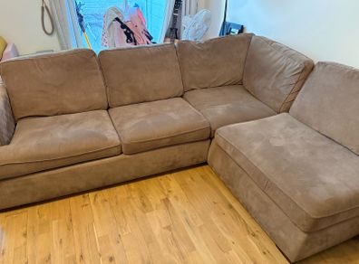 Brown L shape sofa bed
