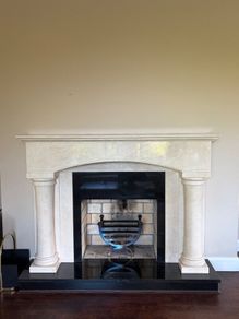 Elegant Marble Fireplace Surround with Pillars