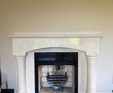Elegant Marble Fireplace Surround with Pillars