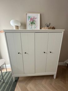 Ikea White storage cabinet Idanas with bi-folding doors