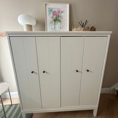 Ikea White storage cabinet Idanas with bi-folding doors
