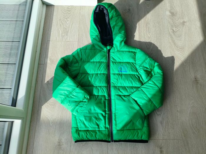 Dunnes Stores green puffer jacket - age 9-10