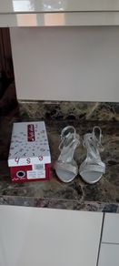 silver sandals and bag