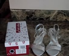 silver sandals and bag