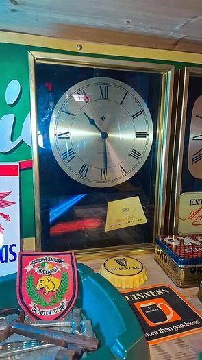 Vintage guinness brass clock