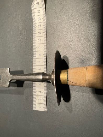 vintage meat carving fork is made of solid steel with a wooden handle and guard possible 1966 British army