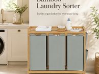 main image for ad Bamboo Laundry Sorter with 3 Removable Bags and Storage Shelf 150L