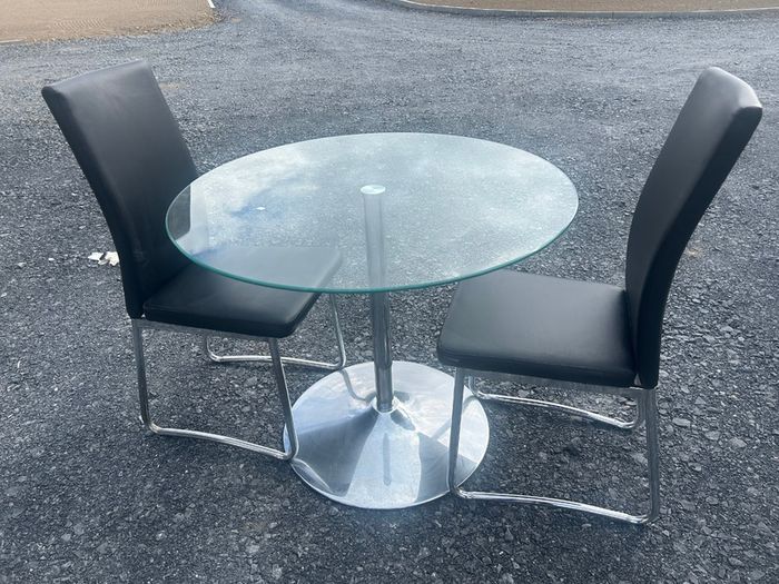 Glass table and two chairs