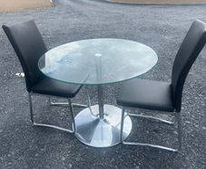 Glass table and two chairs