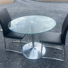 Glass table and two chairs