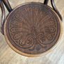 A vintage 1920s Thonet style bentwood chair with armrests. Image 5