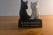 Black and white whiskey statue