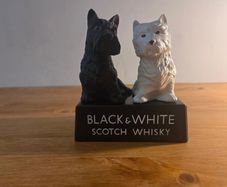 Black and white whiskey statue