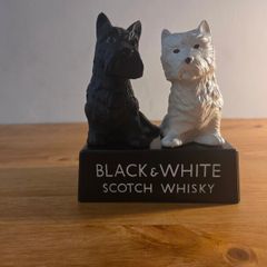 Black and white whiskey statue