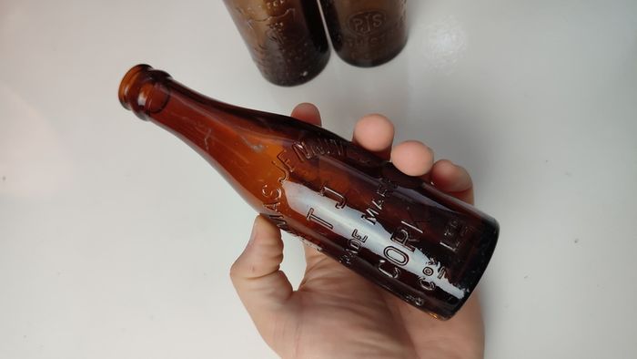 257 - Set of 3 Vintage Brown Glass Scanlan Cades Jennings Collectible Decorative Mineral Water Beer Bottles