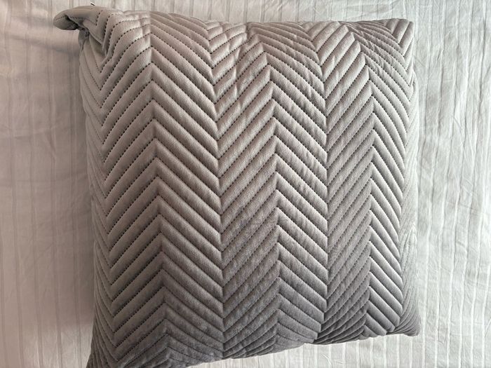2 grey cushions