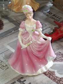 Beautiful Porcelain Mary in a long pink dress holding a Fan and wearing a Hat decorated with pink Roses The Leonardo Collection Postage Available