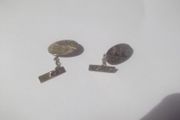 a pair of 9ct  gold cufflink