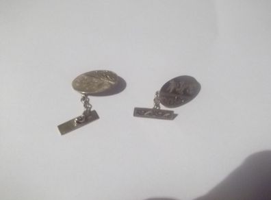 a pair of 9ct  gold cufflink