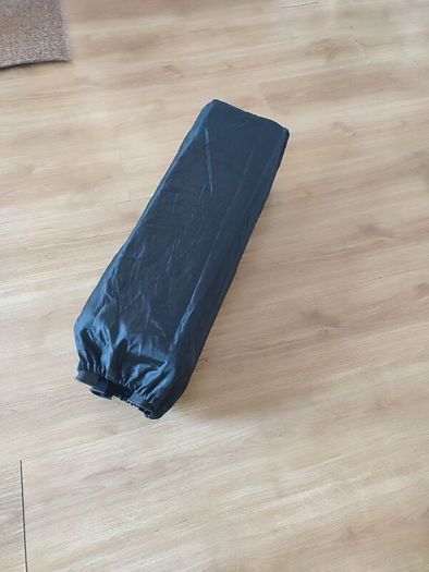Black travel cot