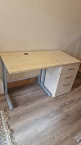 Office desk & filing cabinet.