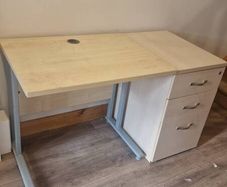 Office desk & filing cabinet.
