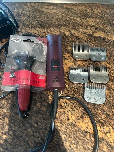 Andis Ultra dog clippers with blades . One blade brand new