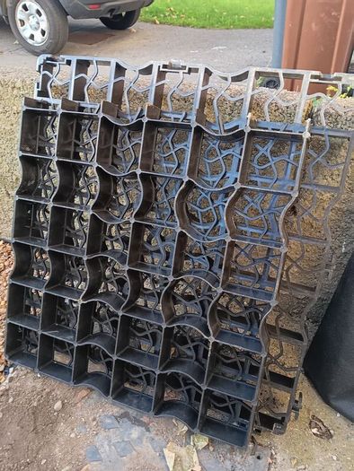 Weed membrane and leftover plastic grids for paving