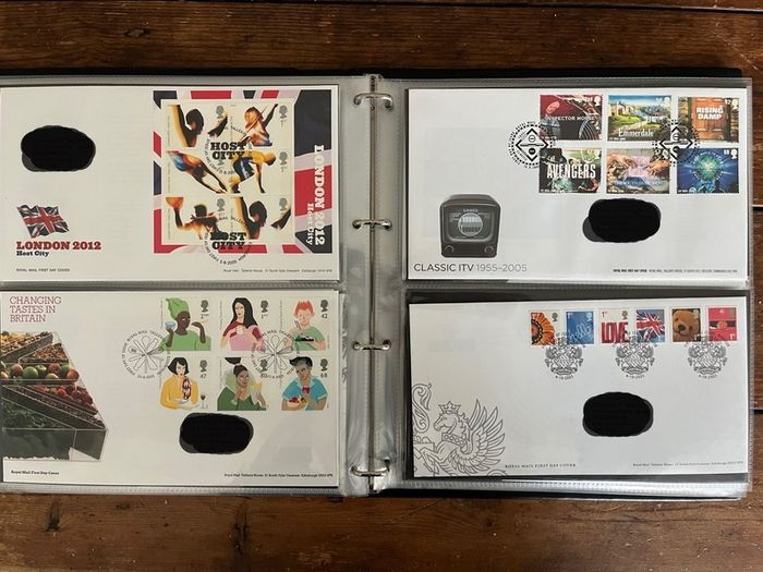 Collection of  87 UK First Day Cover stamps 2003 to 2006 in album