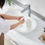 White Oval Ceramic Vessel Sink, 23.3 x 14.2 Inch Modern Countertop Bathroom Basin Image 5