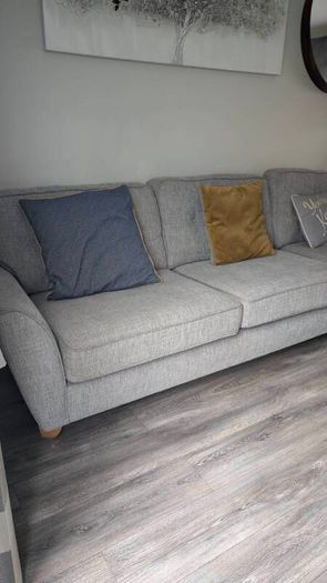 Gray fabric corner chase sofa with footstool