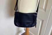 Caroll navy leather crossbody bag