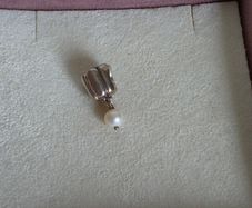 Pandora  charm with pearl drop and purple gemstone in great condition
