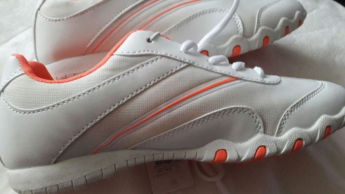 New white runners with tag