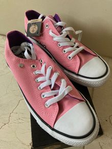 Brand new never worn size 4 pink canvas Dunlop shoes.