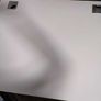 Modern white office desk with grey metal frame Image 4