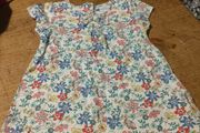 Young Dimension floral print baby dress with a small bow detail at the neckline. New with tags.