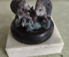 Hedgehog Ornament Ceramic on wood base 2.2 inches set on marble plinth
