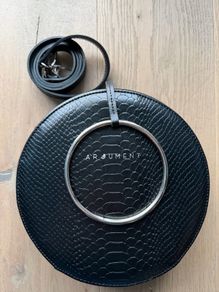 Round leather crossbody bag - Argument