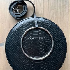 Round leather crossbody bag - Argument