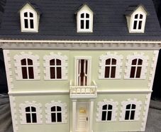 Large Dolls house with furniture and accessories