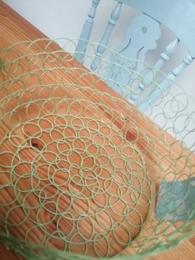 New wire woven basket with wooden handle
