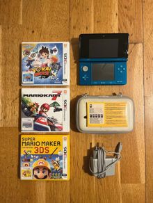 Nintendo 3DS (aqua blue) + three games and accessibility