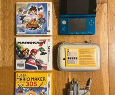 Nintendo 3DS (aqua blue) + three games and accessibility