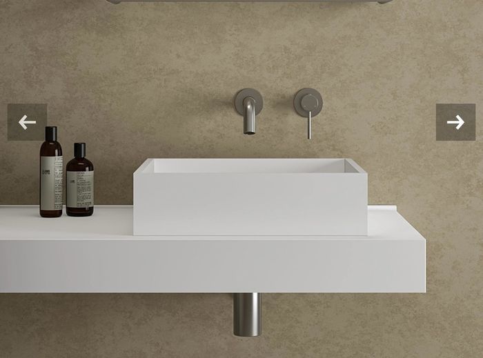 Wall mounted basin mixer tap