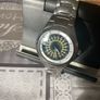 Relic face changing watch with broken watchstrap Image 9