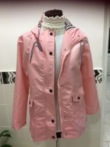 Pink Showerproof jacket with hood. Size 10/12. New