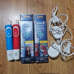 Oral b kids electric toothbrush x 2,brand new 8 heads and two charger