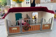 Schleich stables, horses, people and all in pic